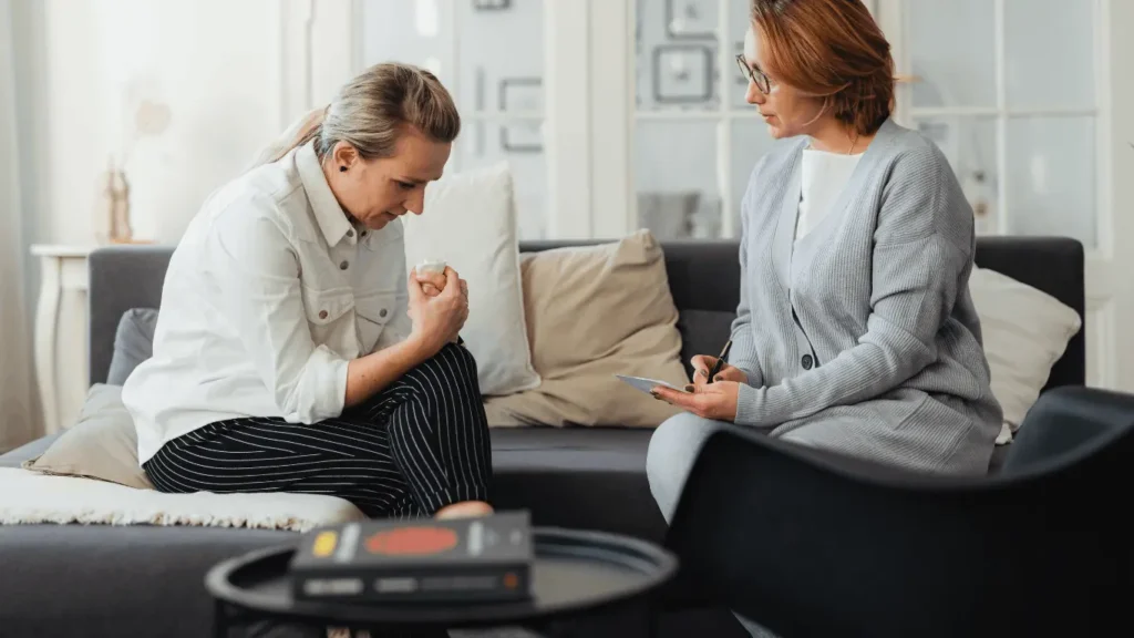 Two people discussing holding an intervention