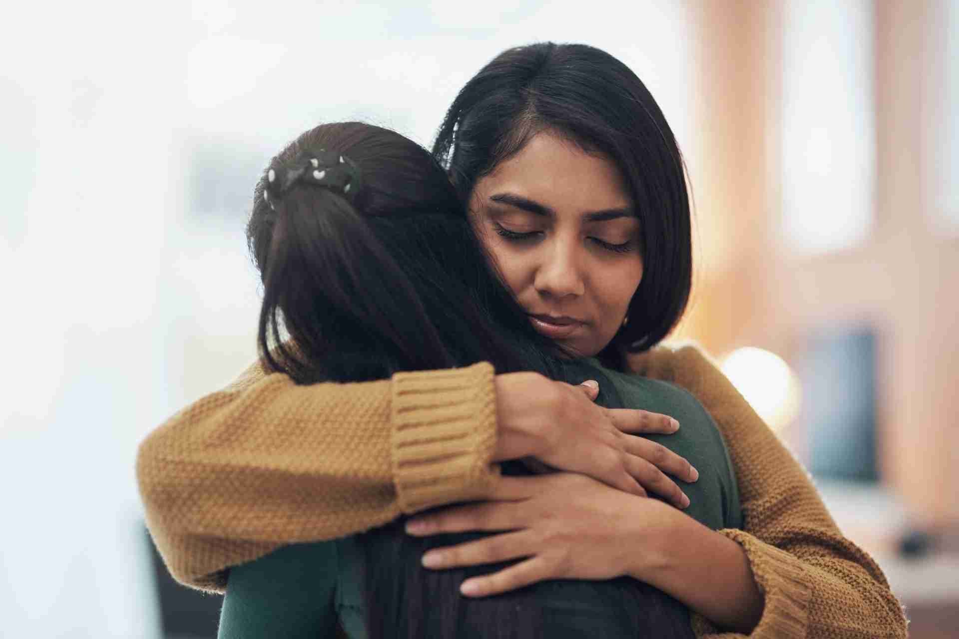 Two individuals sharing emotional support during addiction recovery and aftercare